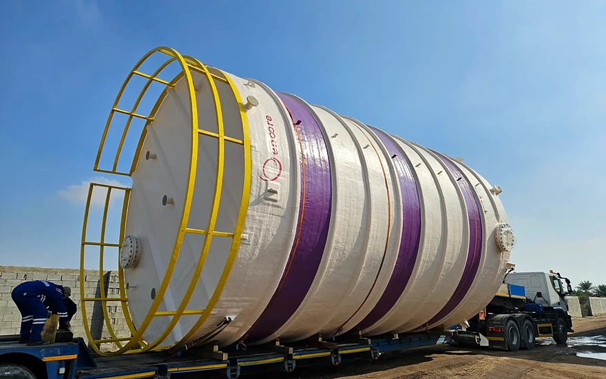 FRP mixing tank with ladder and service platform